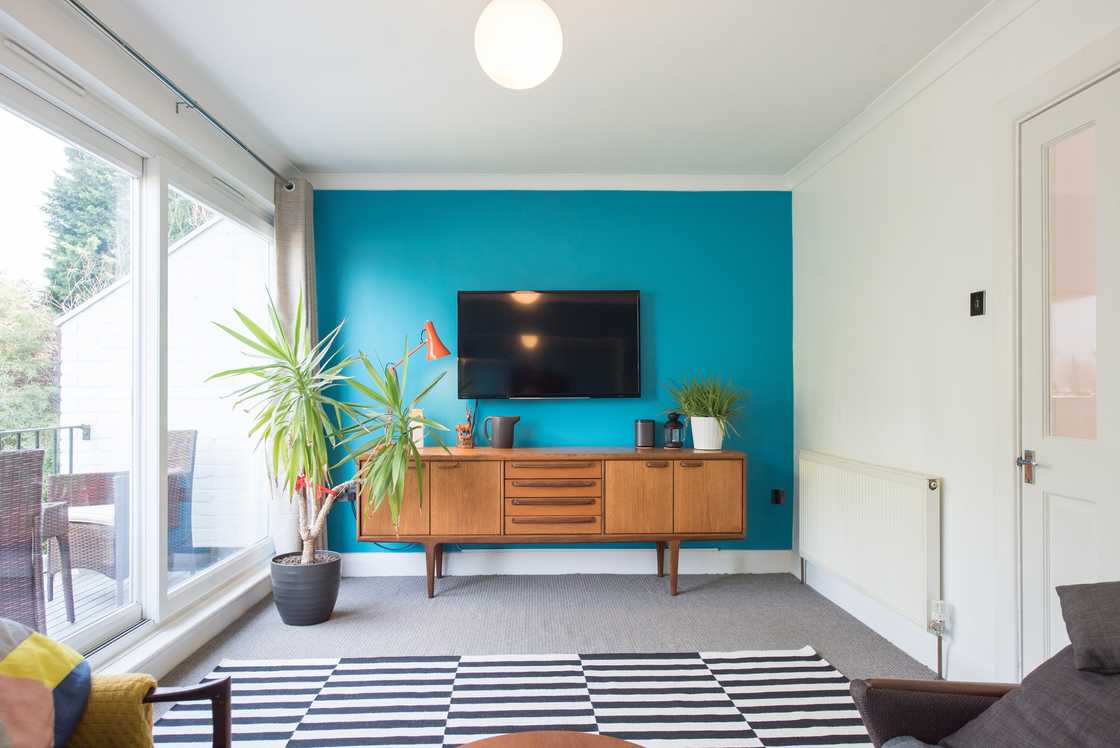 Awkward living room layout with a fireplace Awkward living room layout with a fireplace