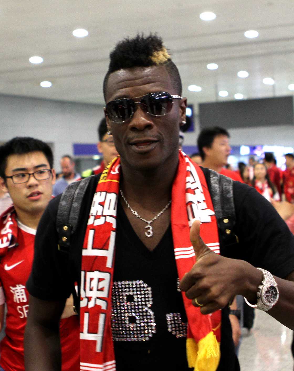 Asamoah Gyan, Pudong International Airport, Shanghai, Chinese Super League, Shanghai SIPG Football Club Asamoah Gyan, Pudong International Airport, Shanghai, Chinese Super League, Shanghai SIPG Football Club