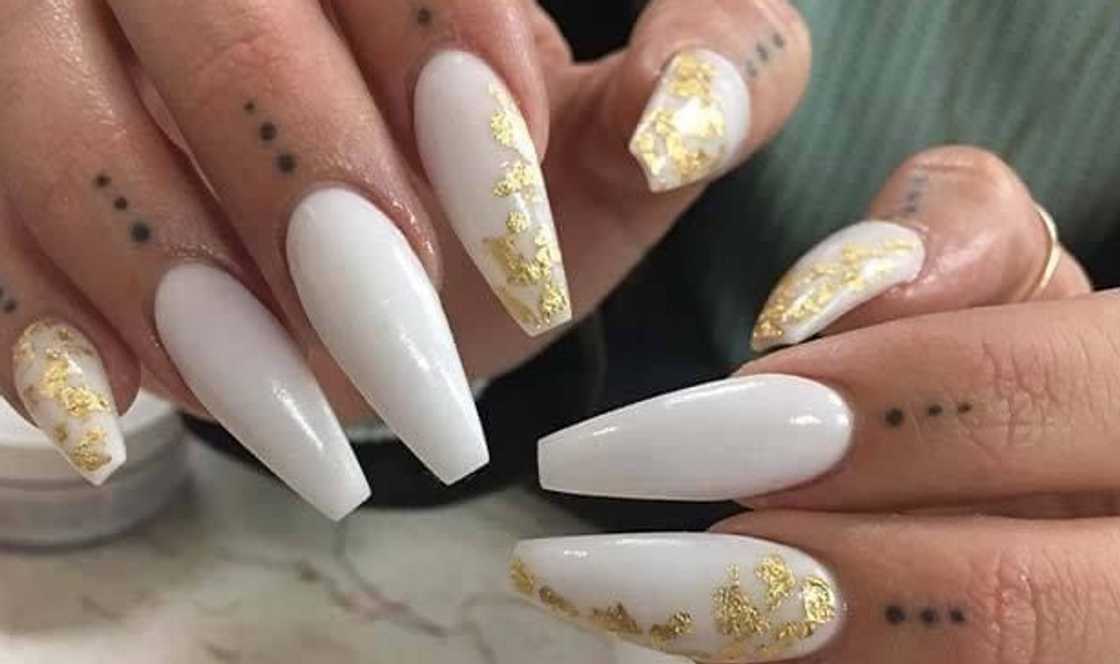 Milky nails with gold foils Milky nails with gold foils