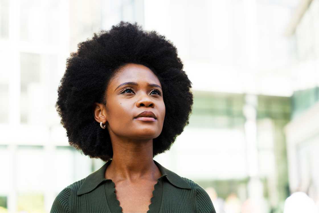 A woman is looking up