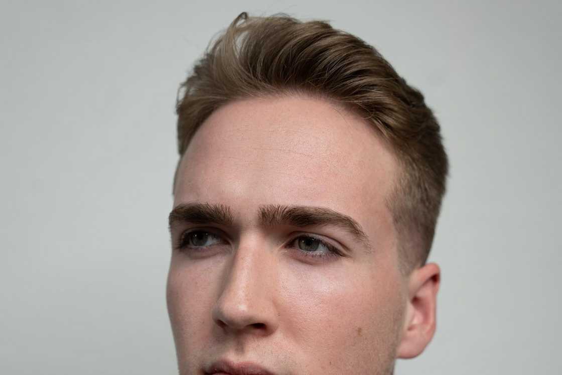 Blowout style with tight fade Blowout style with tight fade