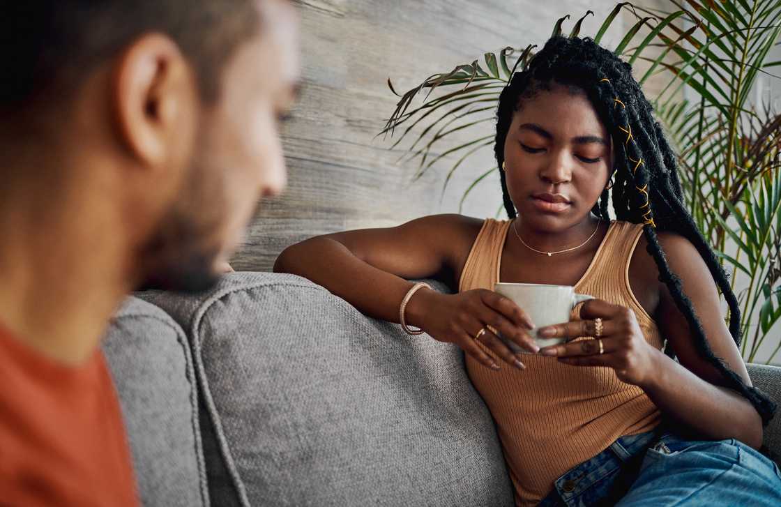 unhappy woman paying no attention to her guy