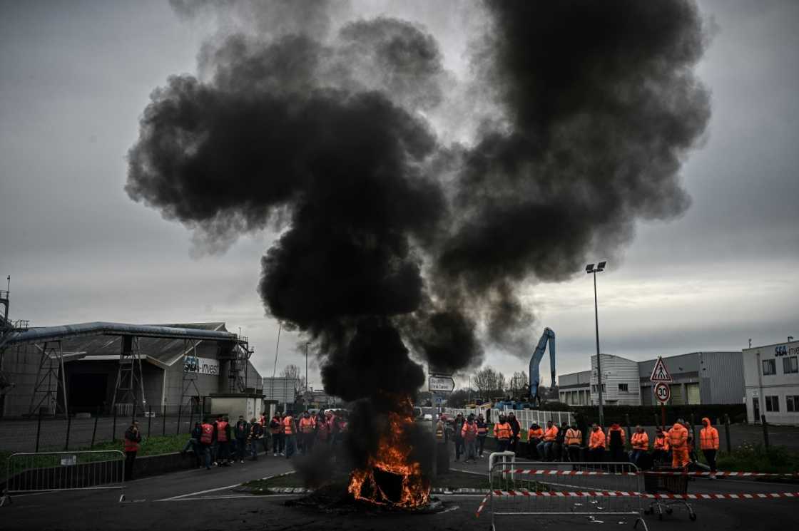 Blockades at oil refineries and some docks, such as this one at Marseille, continue Blockades at oil refineries and some docks, such as this one at Marseille, continue