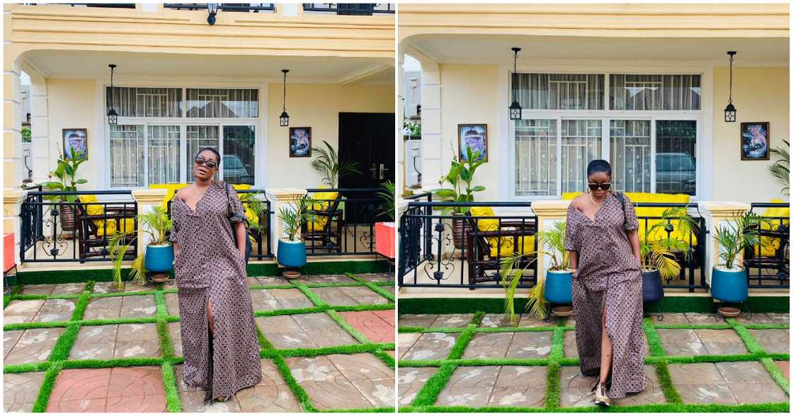 Mzbel poses infront of her mansion Mzbel poses infront of her mansion