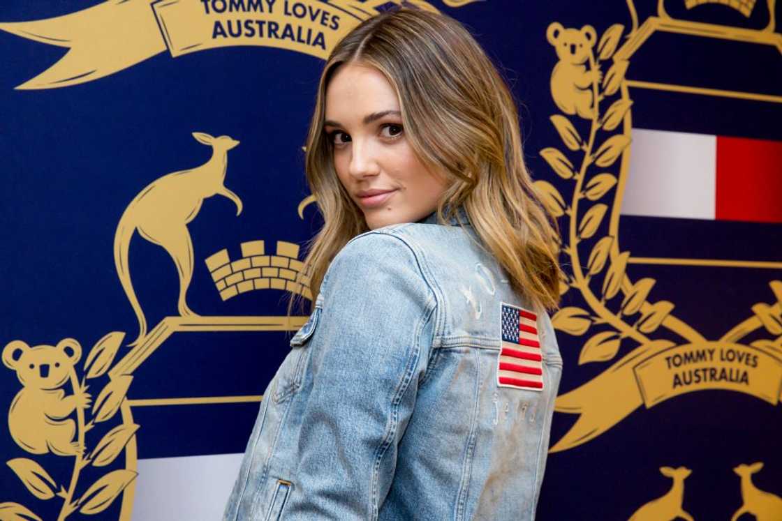Brooke Hogan in a denim jacket with the USA flag at the back Brooke Hogan in a denim jacket with the USA flag at the back