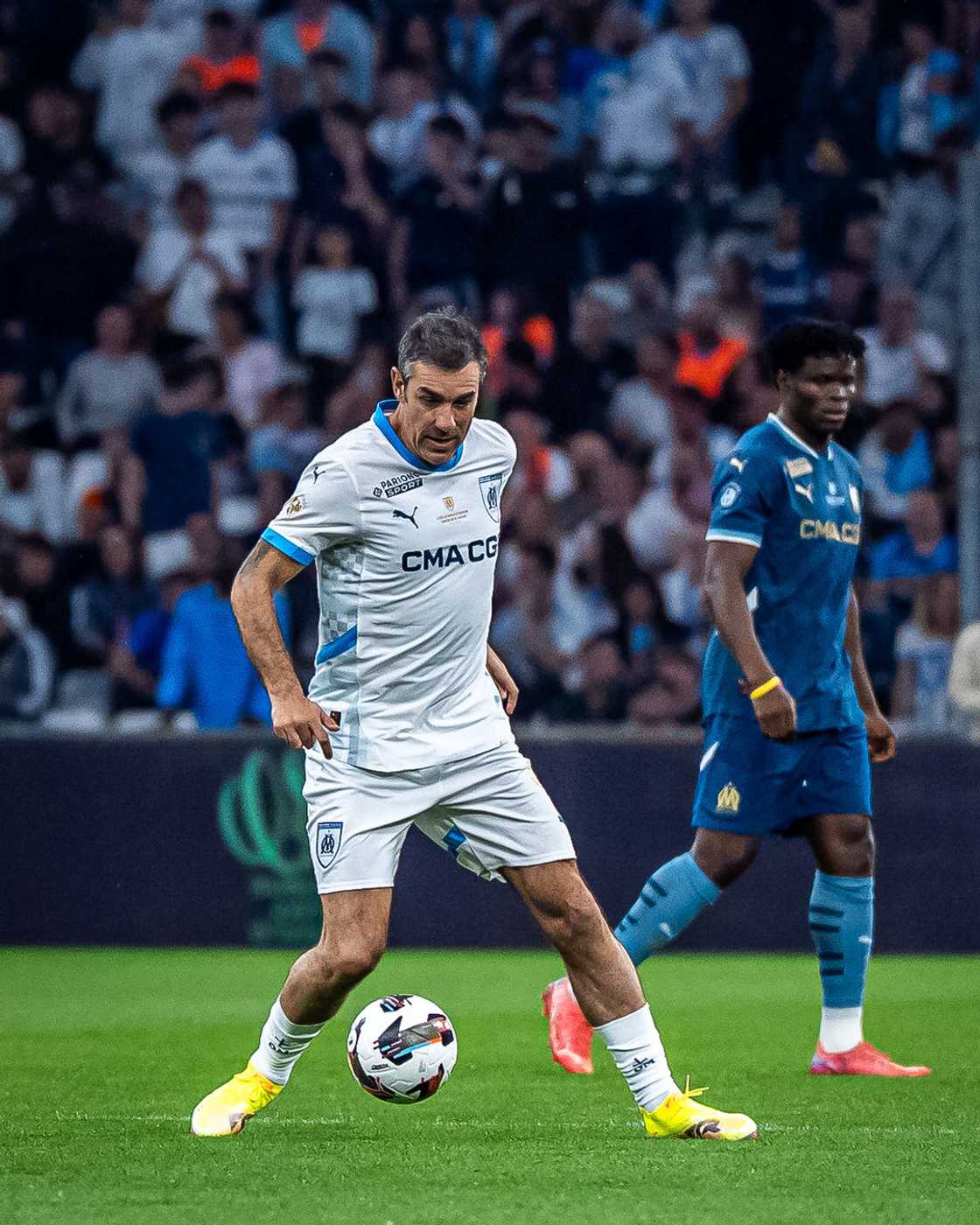 Robert Pires in full action during the match of legends to celebrate 125 years of Olympique de Marseille Robert Pires in full action during the match of legends to celebrate 125 years of Olympique de Marseille