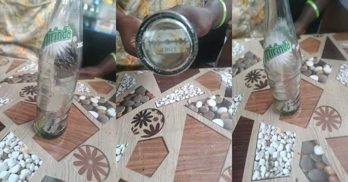 Ghanaian lady reportedly finds blade inside Mirinda bottle after taking the drink Ghanaian lady reportedly finds blade inside Mirinda bottle after taking the drink