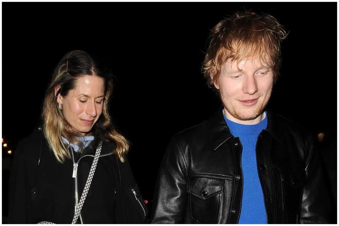 Sheeran and Cherry walking along the street. Sheeran and Cherry walking along the street.