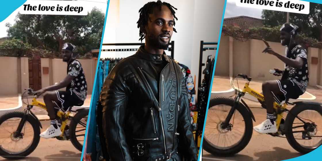 Black Sherif riding bicycle by roadside Black Sherif riding bicycle by roadside