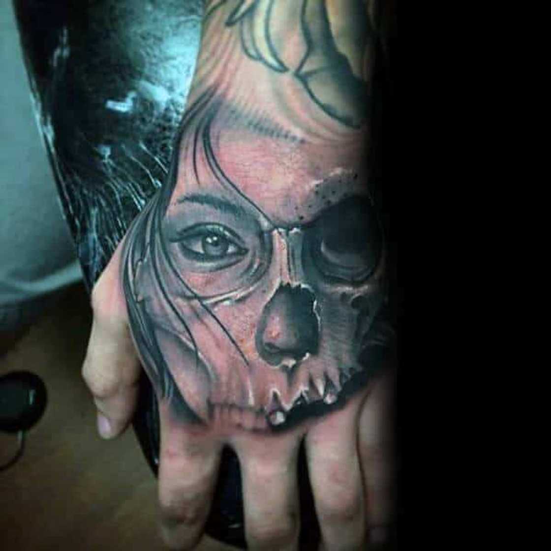 skeleton hand tattoo