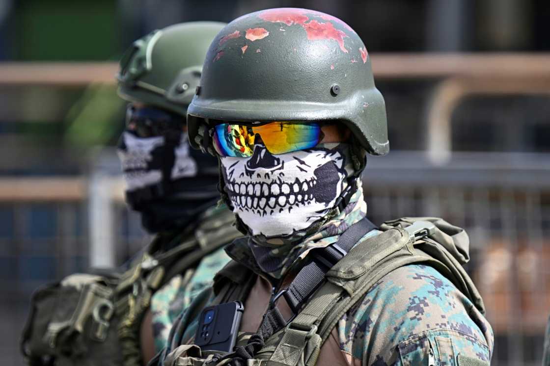 Ecuadoran soldiers guard the perimeter of the Guayas 1 prison amid disturbances there on November 4, 2022 Ecuadoran soldiers guard the perimeter of the Guayas 1 prison amid disturbances there on November 4, 2022