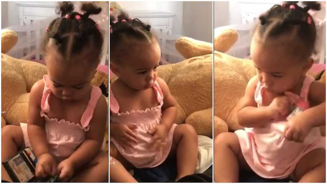 Little baby takes money from a wallet, put it inside her cloth like an adult, video stirs reactions Little baby takes money from a wallet, put it inside her cloth like an adult, video stirs reactions
