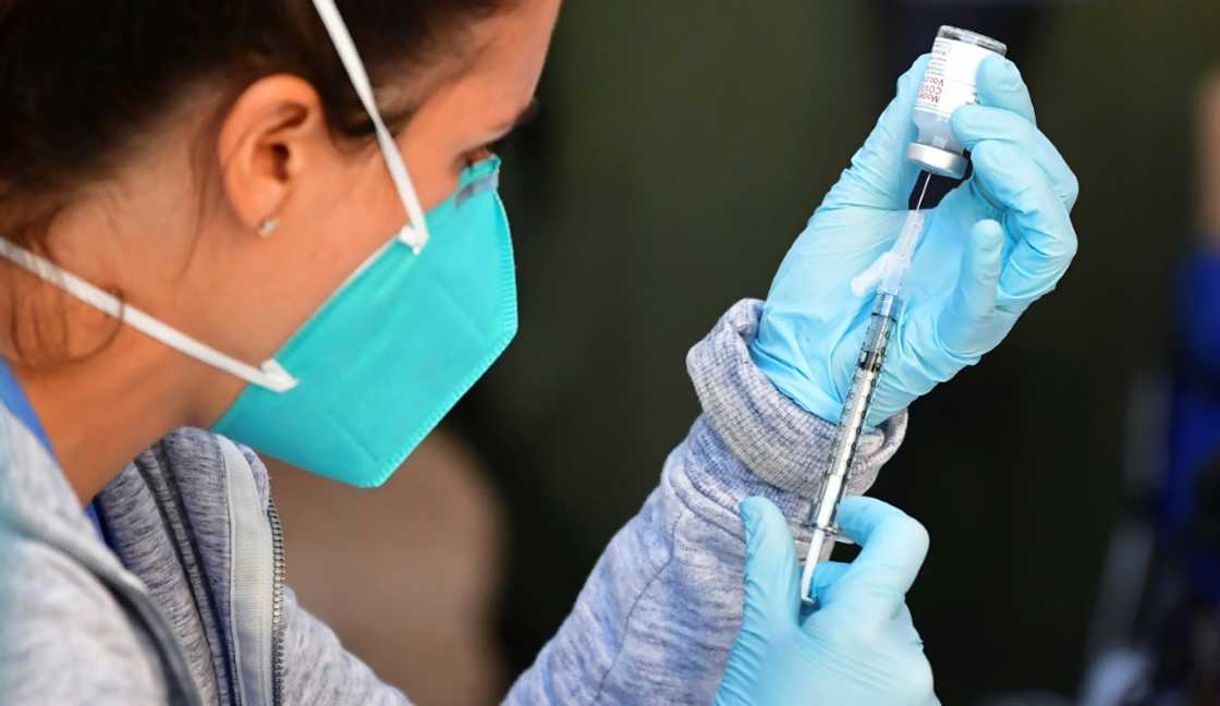 In this file photo from 2021 the Moderna Covid-19 vaccine is loaded into a syringe ahead of an injection In this file photo from 2021 the Moderna Covid-19 vaccine is loaded into a syringe ahead of an injection
