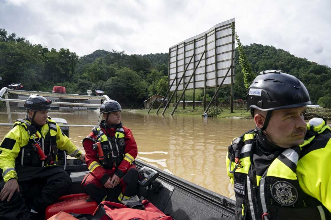 Firefighters head out to rescue people stranded by flooding in Lost Creek, Kentucky Firefighters head out to rescue people stranded by flooding in Lost Creek, Kentucky