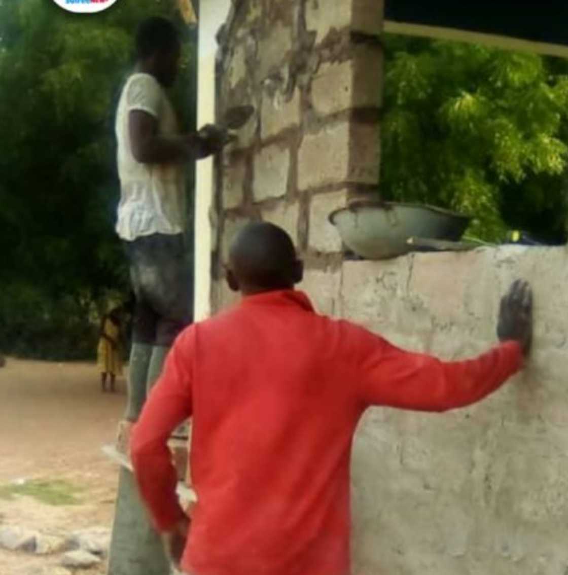 Men working on the Agyata CHPS Zone.