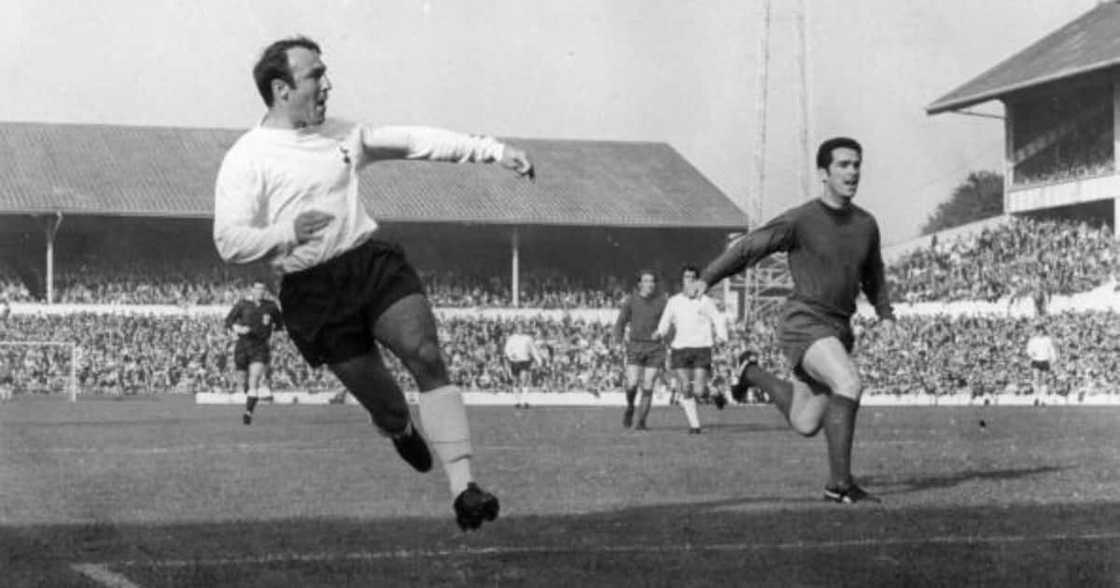 Footballer Jimmy Greaves ( left) of Tottenham Hotspur tries a shot at goal as Spurs play Newcastle United at White Hart Lane. (Photo by Douglas Miller/Keystone/Getty Images)