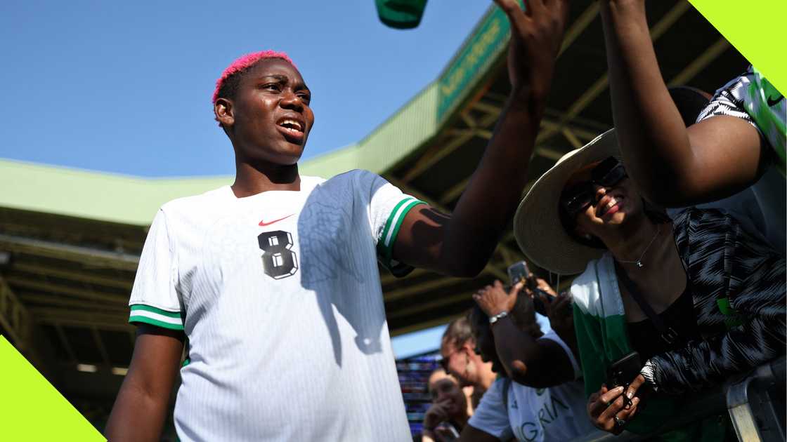 Asisat Oshoala with the fans after Nigeria exit the Olympics.