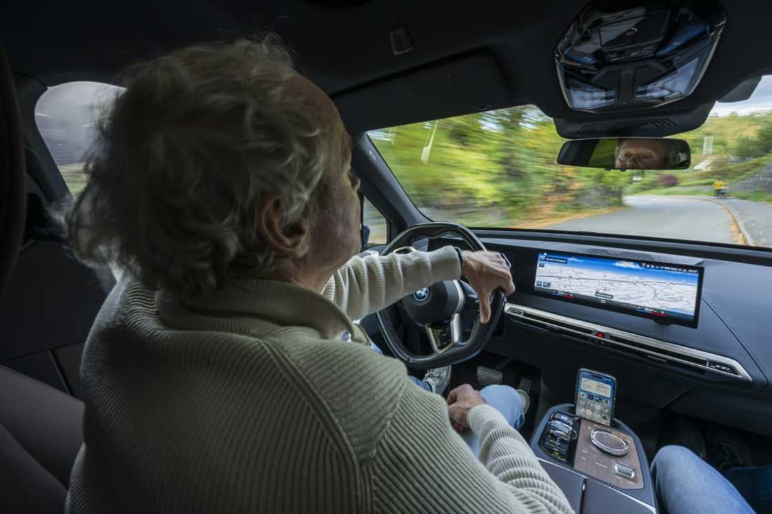 Baard Gundersen at the wheel of his electric BMW iX in Baerum, Oslo