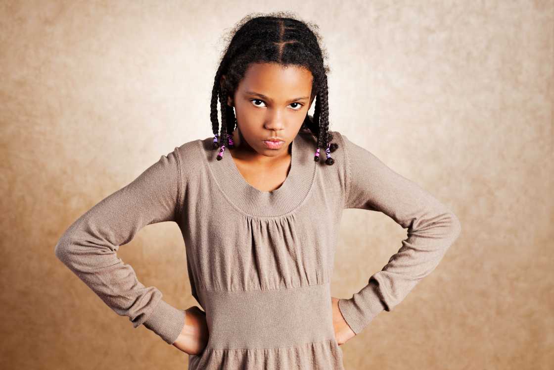 An angry girl standing