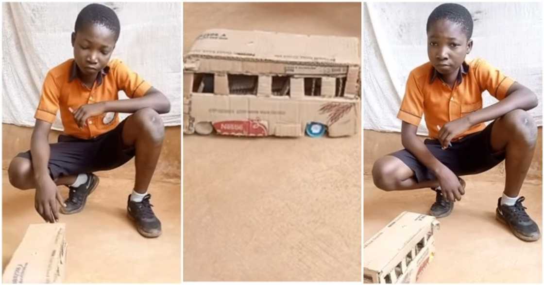 Ghanaian boy builds car with carton. Ghanaian boy builds car with carton.