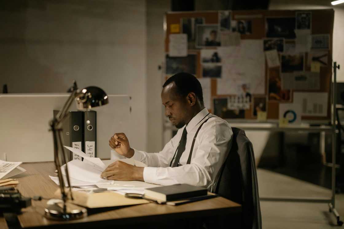 A detective checking documents