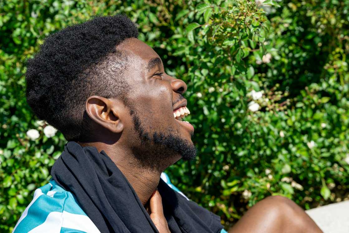 A man laughing out loud A man laughing out loud