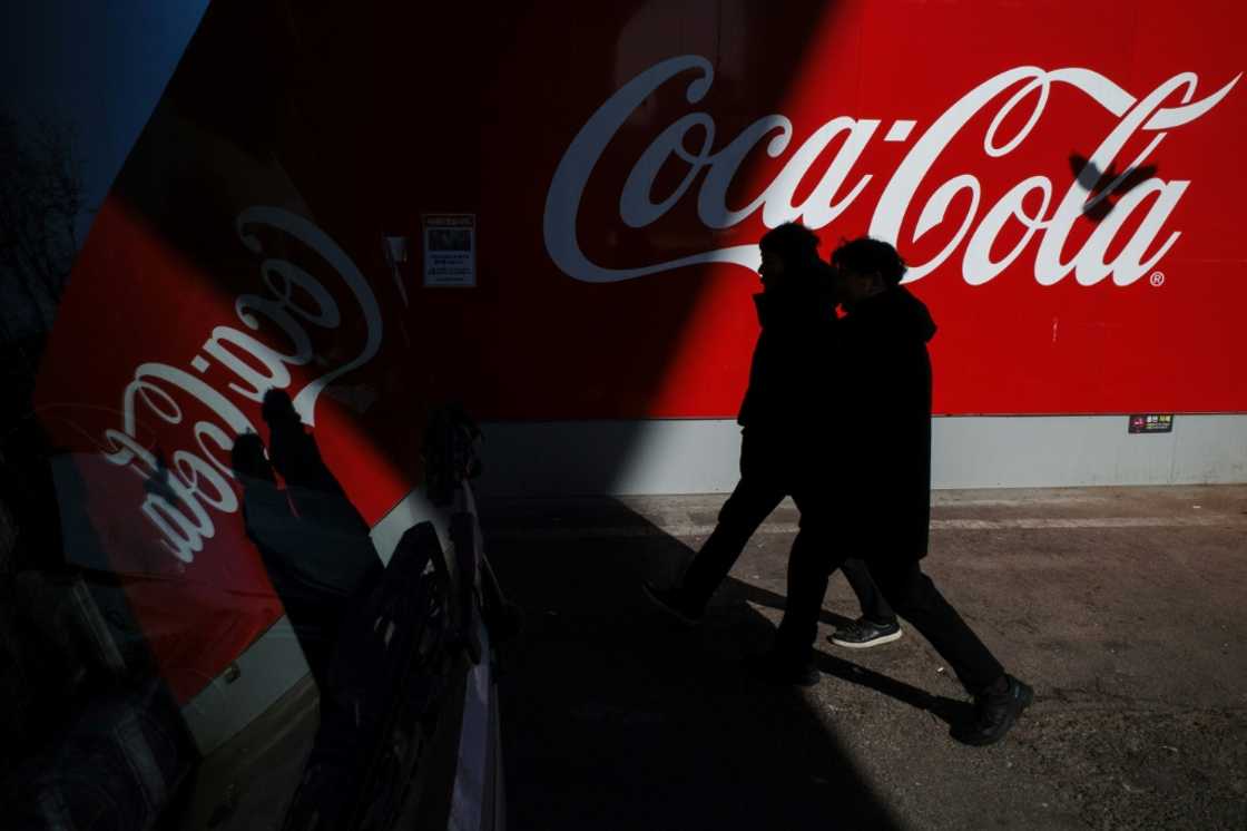 This week sees the release of earnings from some big-name US firms including Coca-Cola, Tesla and Intel This week sees the release of earnings from some big-name US firms including Coca-Cola, Tesla and Intel