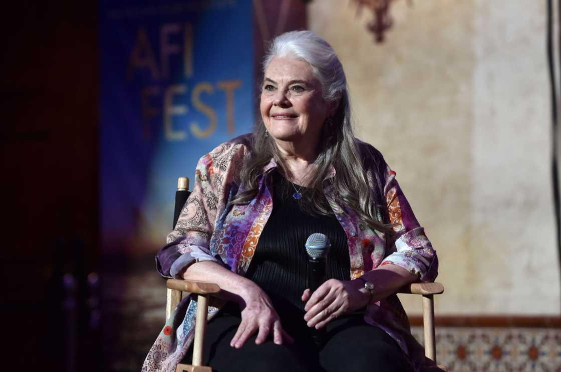 Lois Smith holding a microphone Lois Smith holding a microphone