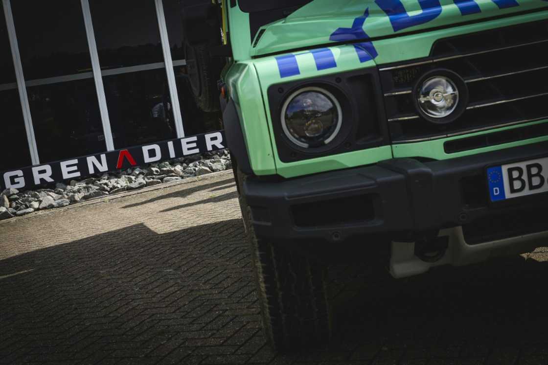 An Ineos hydrogen-fuelled Grenadier car is driven on a test track during a 'Roadmap to Decarbonisation' event