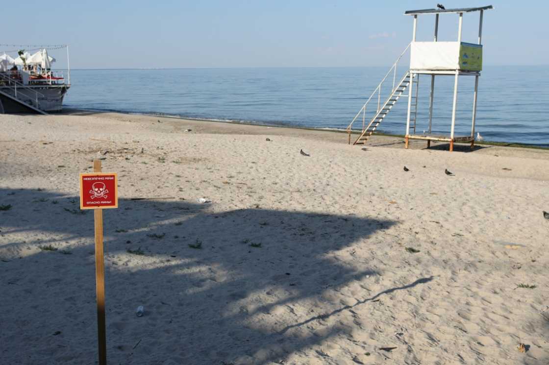 Signs warn people not to go swimming in the waters off Odessa Signs warn people not to go swimming in the waters off Odessa