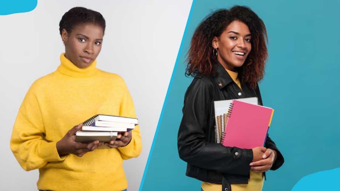 Confident students holding books