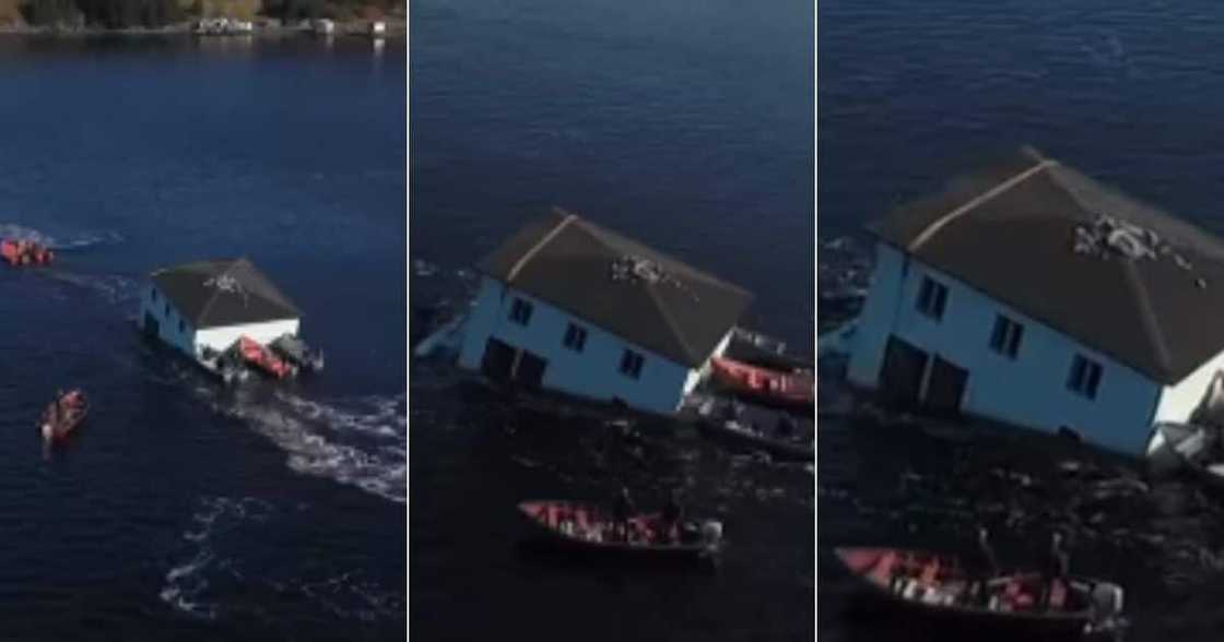 World Wowed, by Candian Couple, Who Moved Entire, House Across the Island