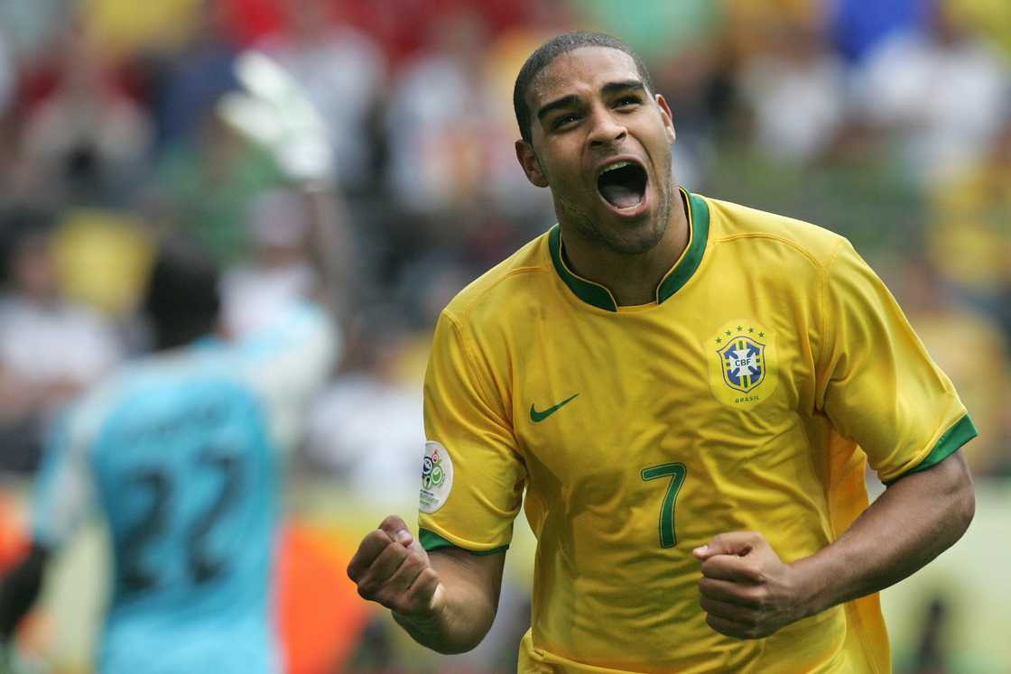 Adriano: Brazil star looks unrecognisable while drinking beer barefoot in street Adriano: Brazil star looks unrecognisable while drinking beer barefoot in street