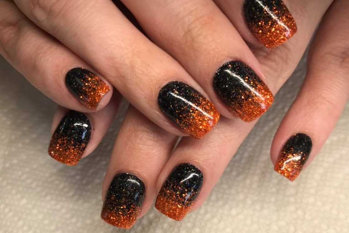 Black and orange nails Black and orange nails