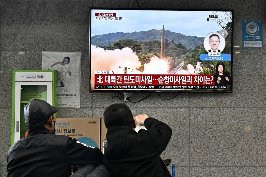 Visitors watch file footage of a North Korean missile test at the ferry terminal of South Korea's Ulleungdo island earlier this month Visitors watch file footage of a North Korean missile test at the ferry terminal of South Korea's Ulleungdo island earlier this month