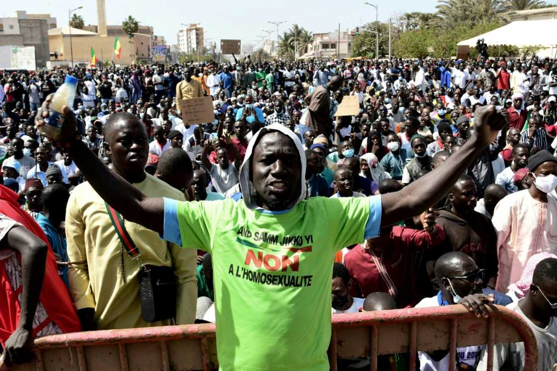 A protester at an anti-gay rally in the Senegalese capital Dakar in May wears a T-shirt proclaiming, 'No to homosexuality' A protester at an anti-gay rally in the Senegalese capital Dakar in May wears a T-shirt proclaiming, 'No to homosexuality'