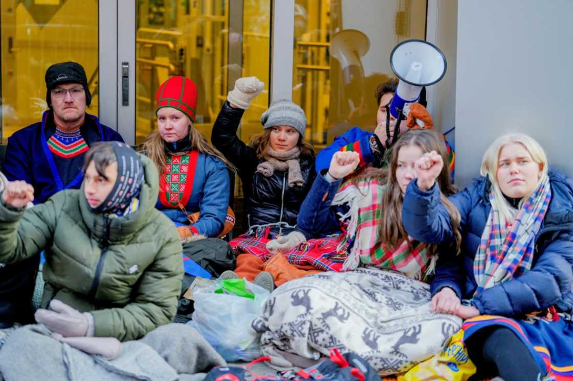 Climate activist Greta Thunberg (C) was among the protesters Climate activist Greta Thunberg (C) was among the protesters