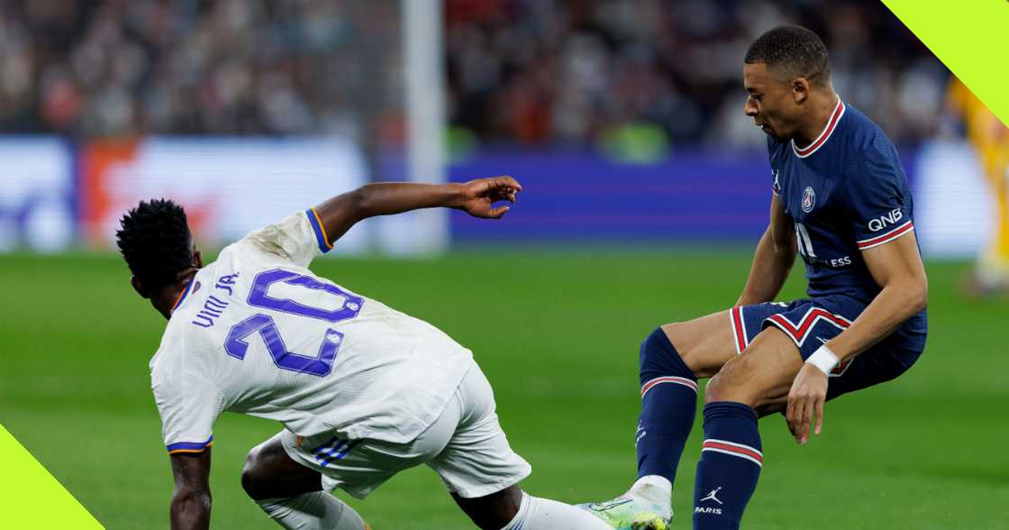 Vinicius Jr and Kylian Mbappe during a UCL clash Vinicius Jr and Kylian Mbappe during a UCL clash