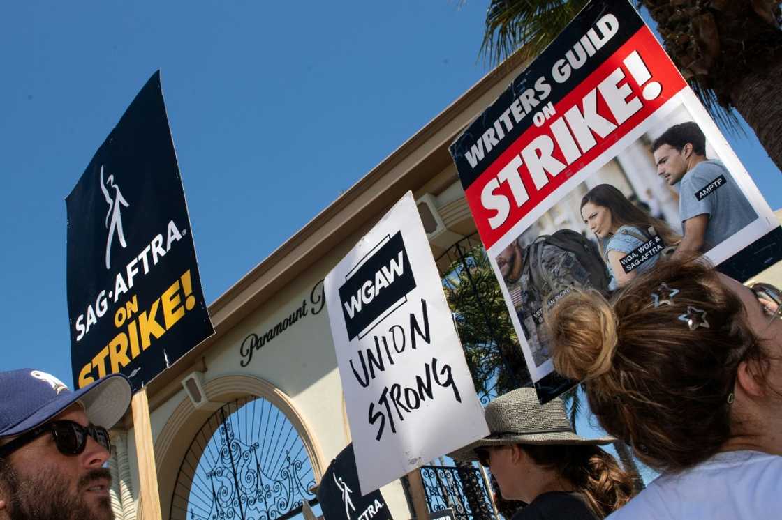 Members of the Writers Guild of America and the Screen Actors Guild walk a picket line outside of Paramount Pictures Members of the Writers Guild of America and the Screen Actors Guild walk a picket line outside of Paramount Pictures