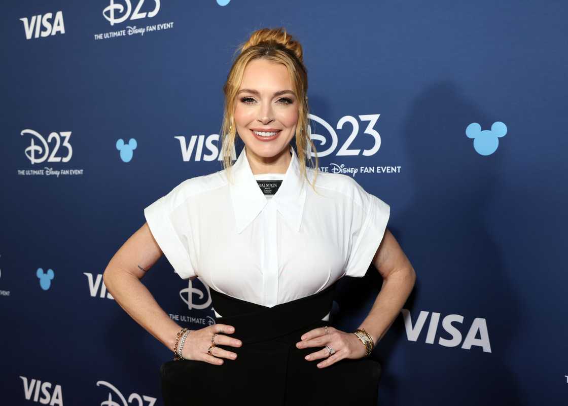 Lindsay Lohan poses at D23: The Ultimate Disney Fan Event. Lindsay Lohan poses at D23: The Ultimate Disney Fan Event.