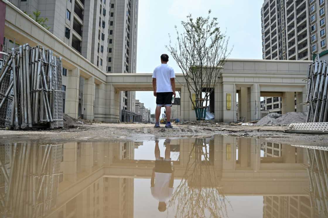 "There's no point getting angry, because there's nothing I can do," said homebuyer Wang