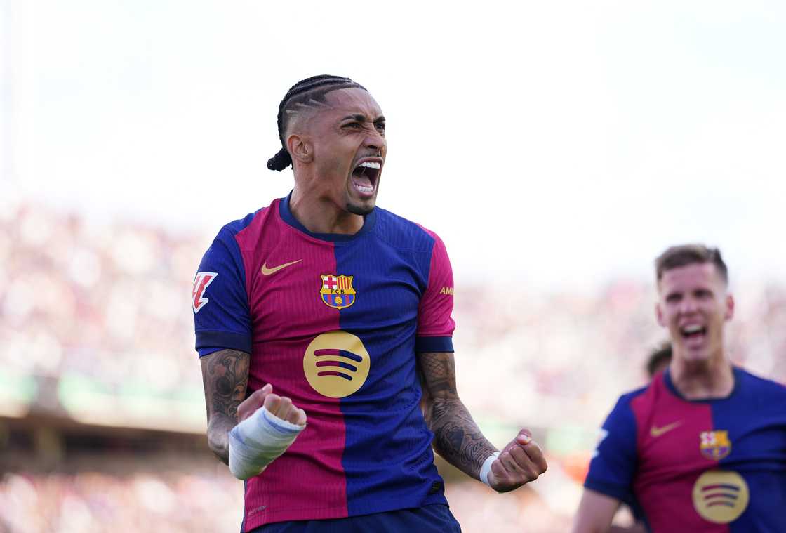 Raphinha of FC Barcelona celebrates scoring his team's fourth goal which was taken from the penalty spot during the La Liga match between FC Barcelona and RC Celta de Vigo at Estadi Olimpic Lluis Companys on April 19, 2025 in Barcelona, Spain Raphinha of FC Barcelona celebrates scoring his team's fourth goal which was taken from the penalty spot during the La Liga match between FC Barcelona and RC Celta de Vigo at Estadi Olimpic Lluis Companys on April 19, 2025 in Barcelona, Spain