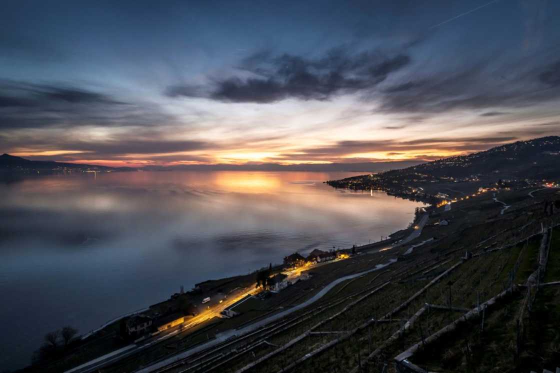Lake Geneva after sunset above the vineyard terraces of Lavaux Lake Geneva after sunset above the vineyard terraces of Lavaux