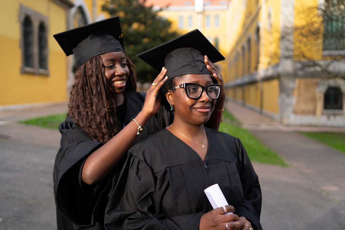 Tw ladies on their graduation day Tw ladies on their graduation day