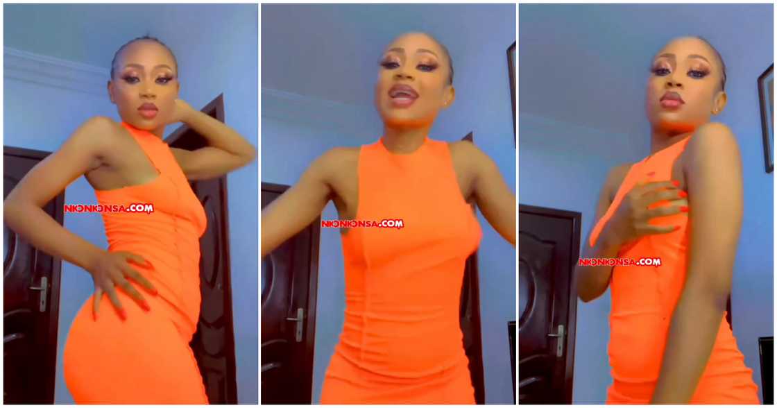 Akuapem Poloo slays in an orange dress