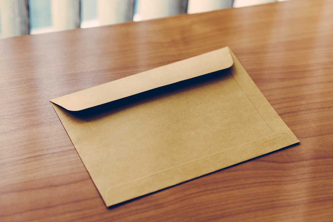 A brown envelope on office table A brown envelope on office table