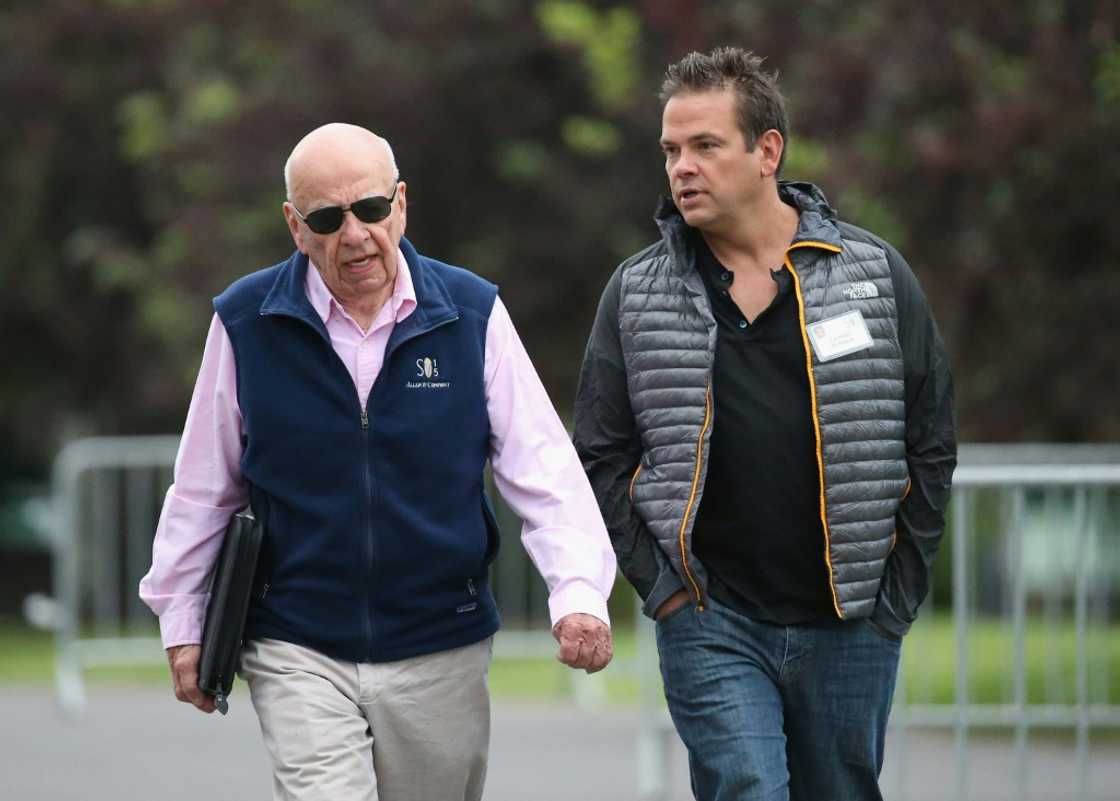 Fox Corporation CEO Lachlan Murdoch (R), pictured with father Rupert, is suing independent media outlet Crikey for defafamation Fox Corporation CEO Lachlan Murdoch (R), pictured with father Rupert, is suing independent media outlet Crikey for defafamation