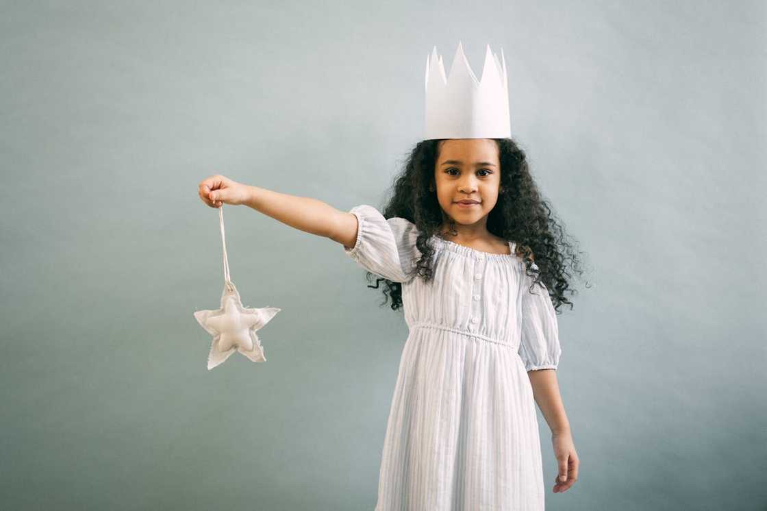 Cute black girl in a Halloween princess costume