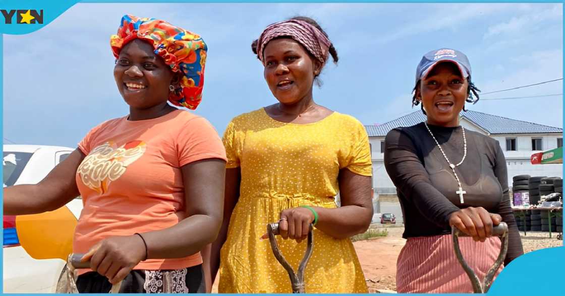 Photo of the three Ghanaian ladies doing voluntarily road work. Photo of the three Ghanaian ladies doing voluntarily road work.
