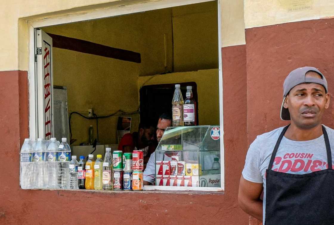 Cubans can extract dollars from the bank but in limited quantities, meaning that black market dealers can charge a premium Cubans can extract dollars from the bank but in limited quantities, meaning that black market dealers can charge a premium